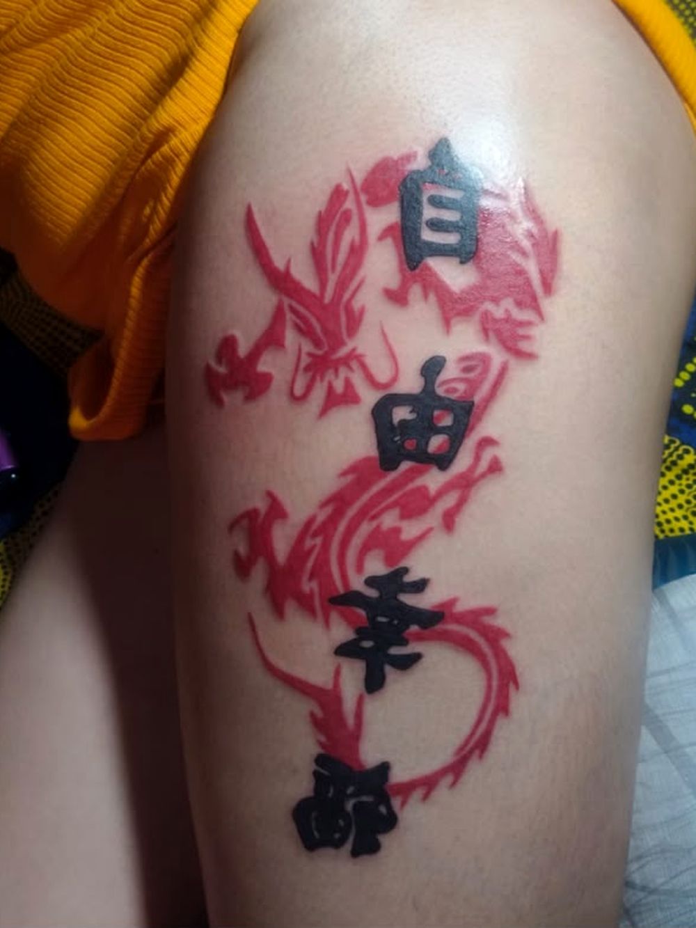 Colour dragon with black lettering, thigh